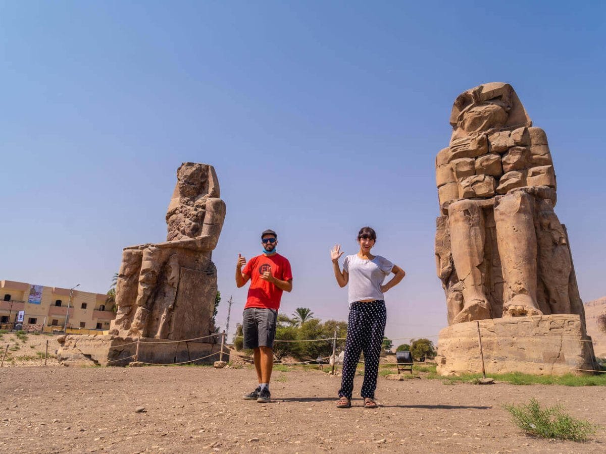 A picture of a couple from their visit to the two statues of Memnon in Luxor
