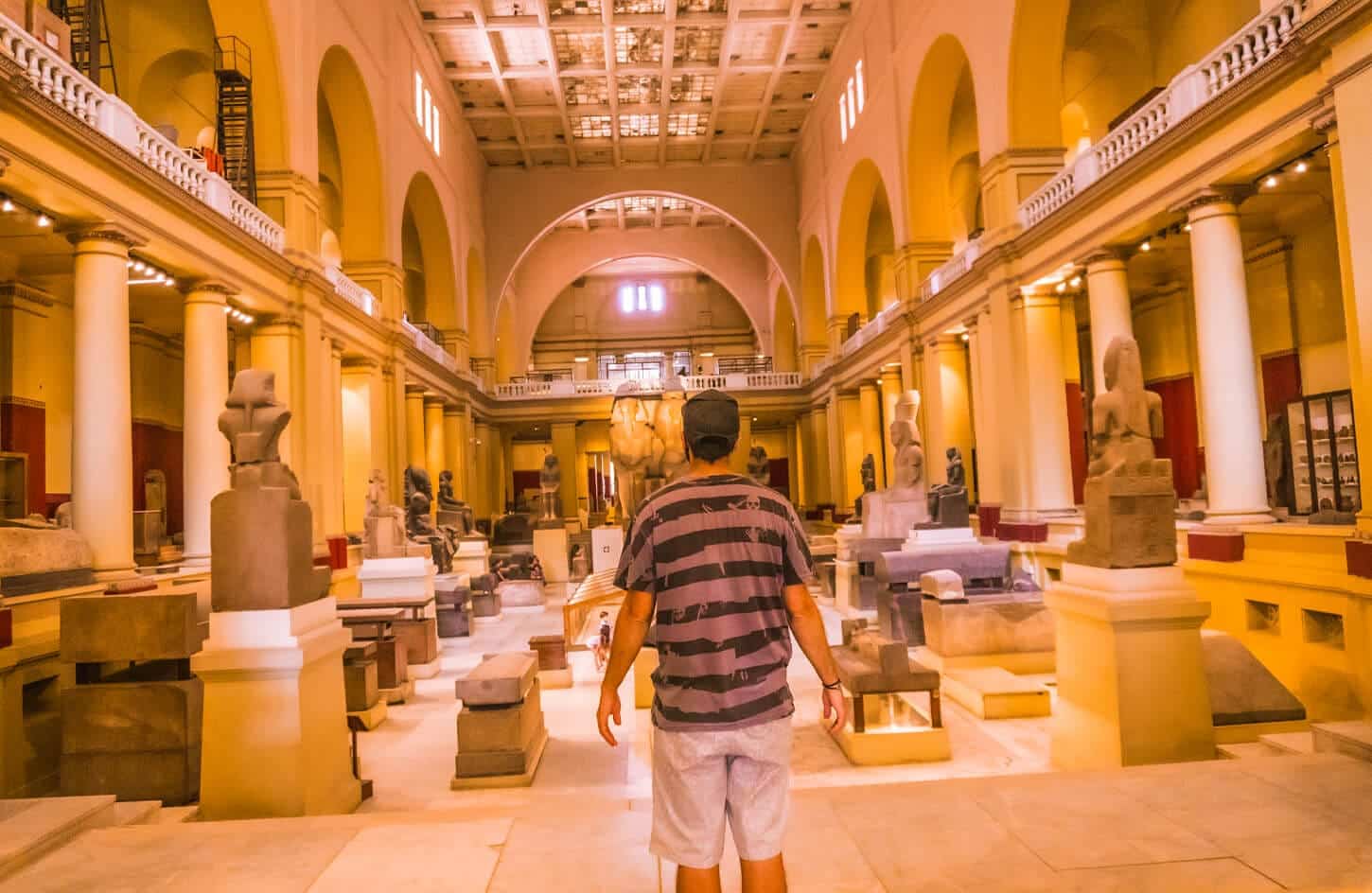 A picture of a visitor in the first hall of the Egyptian Museum