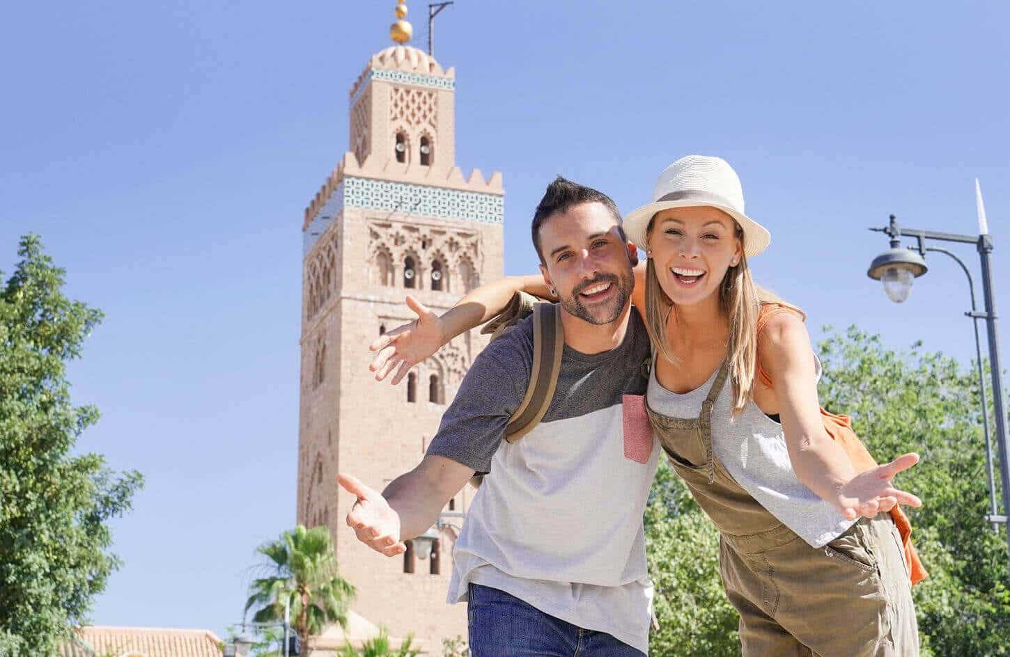 A wonderful picture of a couple in front of the Sultan Hassan Mosque in Morocco