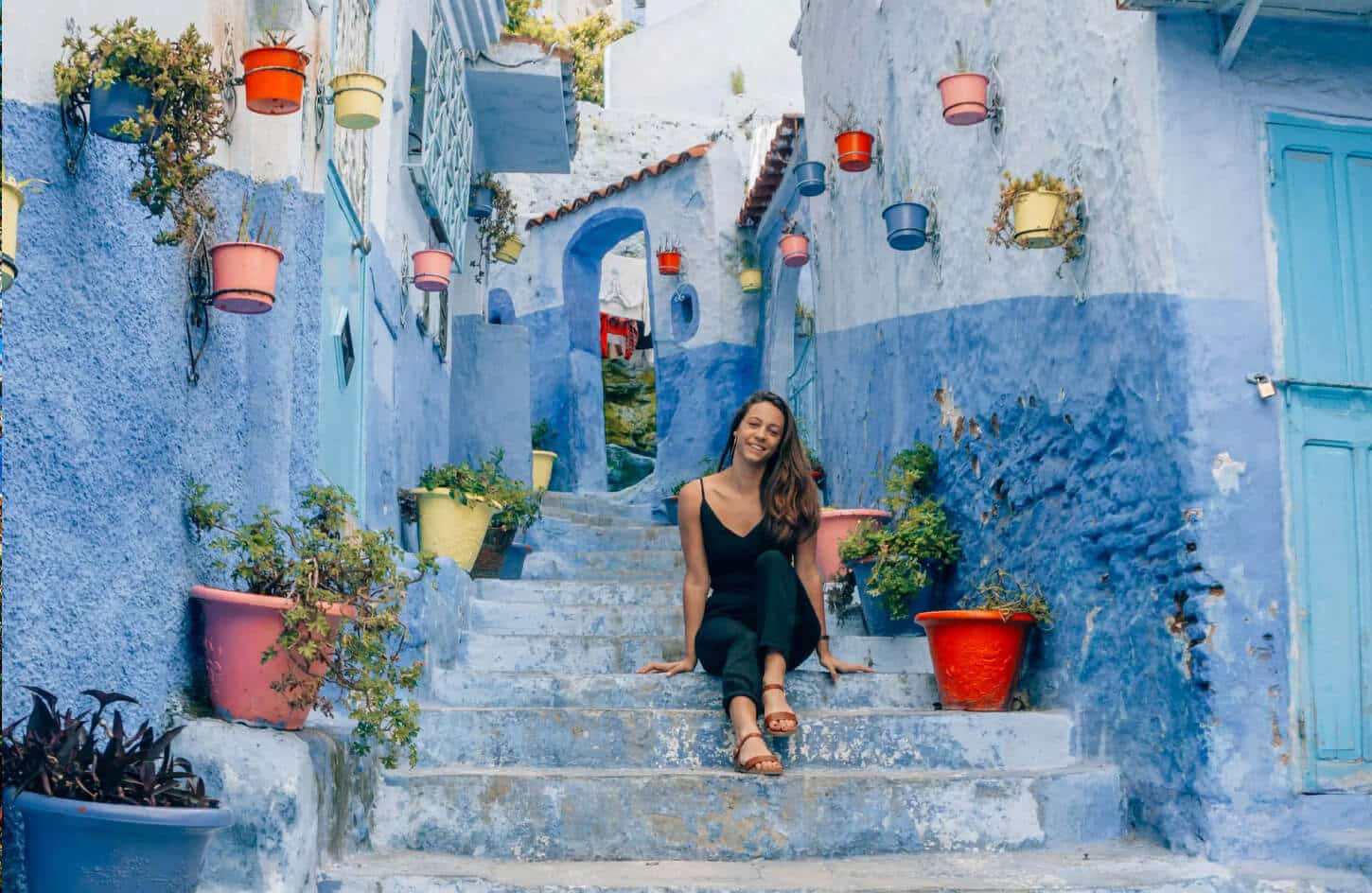 A wonderful picture of a woman from the blue city of Chefchaouen