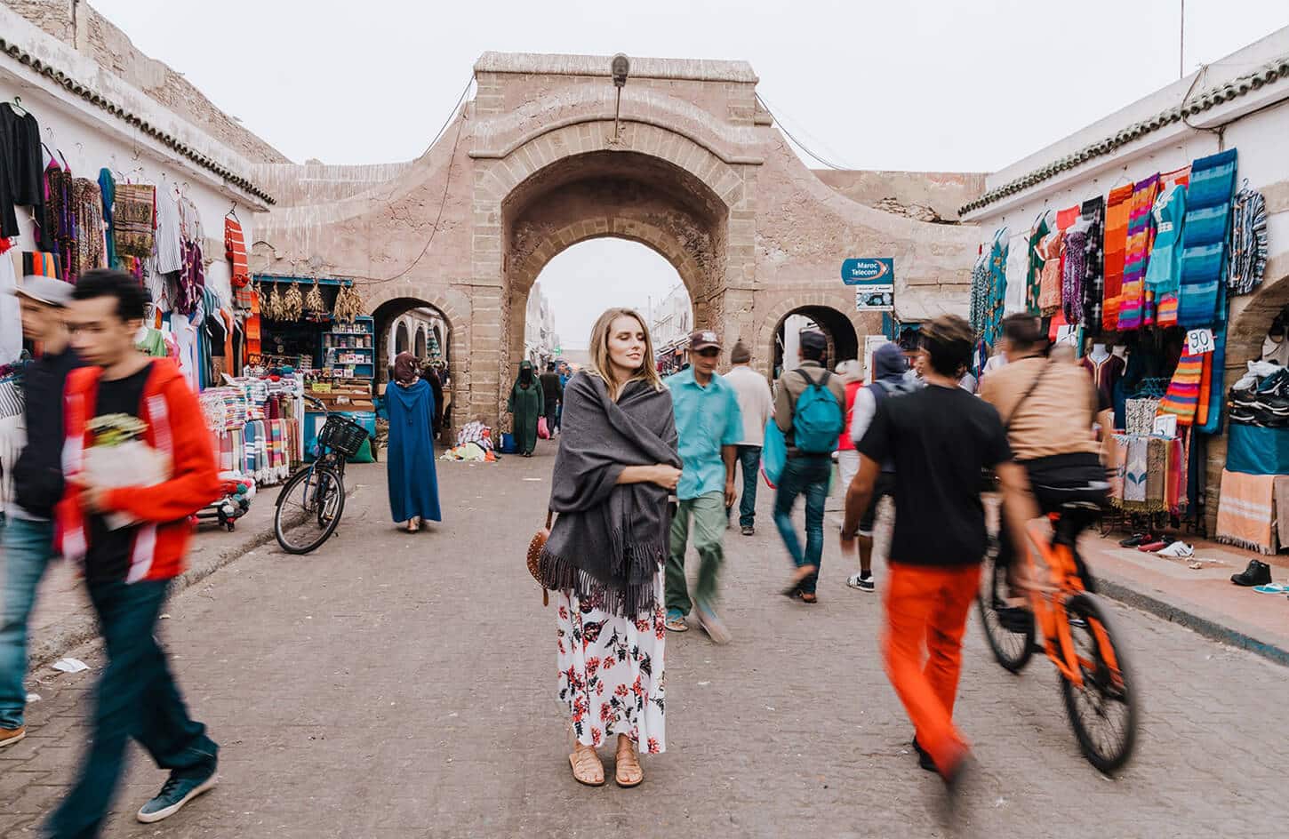 A wonderful picture of a woman in a market on a coastal trip in Essaouira