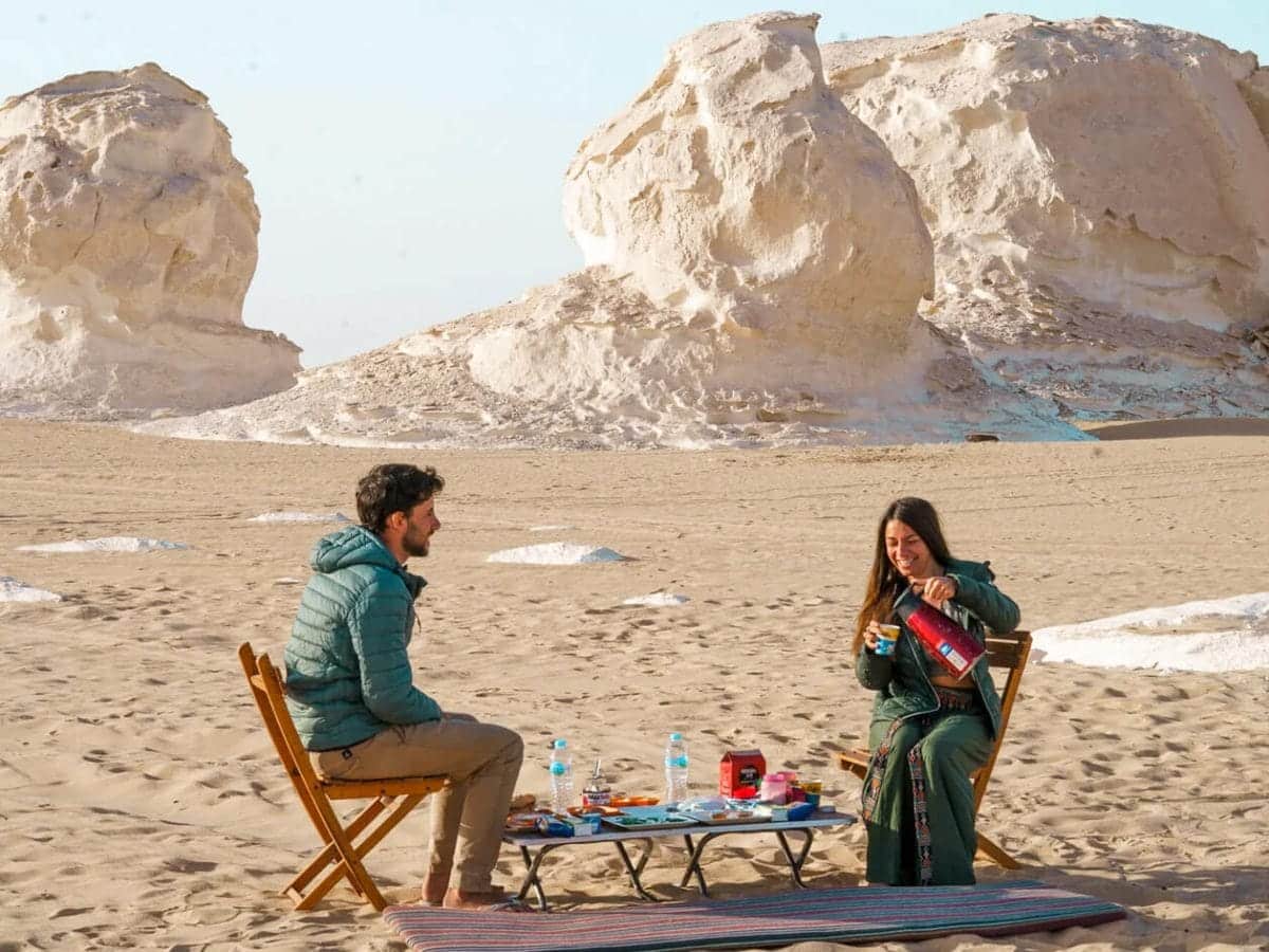 A wonderful shot of a couple enjoying breakfast in Bahariya Oasis