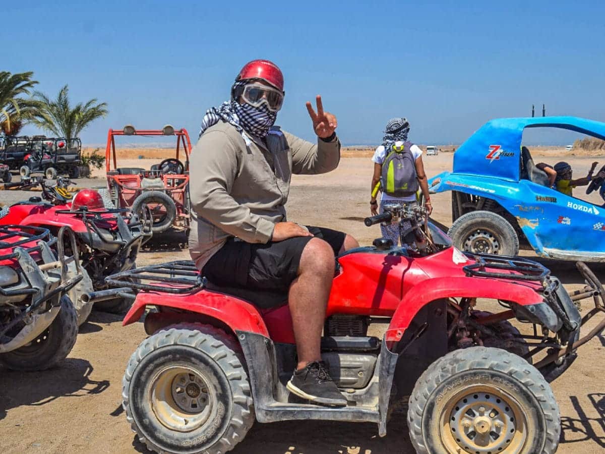 A wonderful shot of a person riding a quad bike from one of the safari trips in Hurghada
