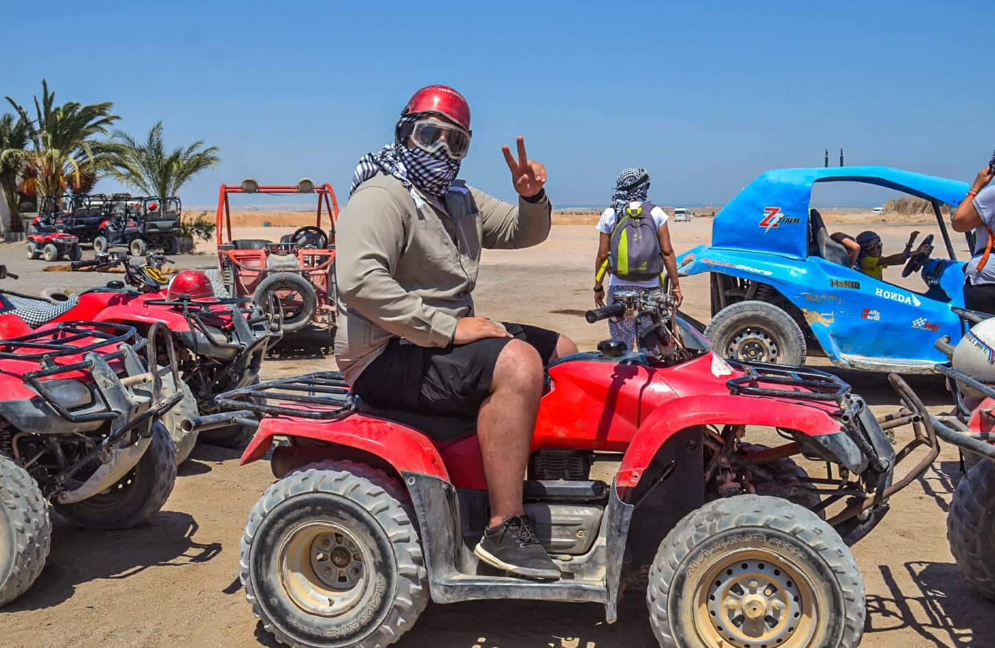 A wonderful shot of a person riding a quad bike from one of the safari trips in Hurghada