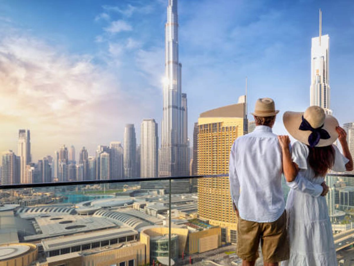 Beautiful picture of the couple in front of Burj Khalifa - Middle East Tours | Multi-Country Tour Packages