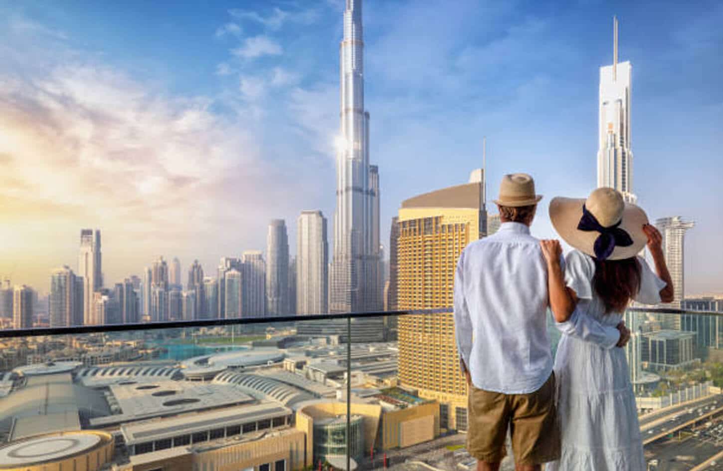 Beautiful picture of the couple in front of Burj Khalifa - Middle East Tours | Multi-Country Tour Packages