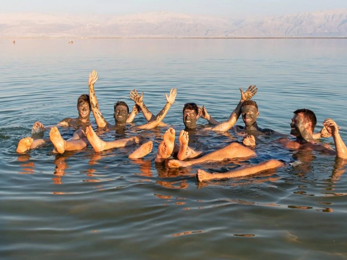 Great picture of a group of young people in the Dead Sea