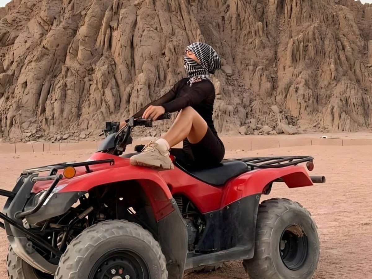 Great picture of a woman in the Marsa Alam desert Quad bike