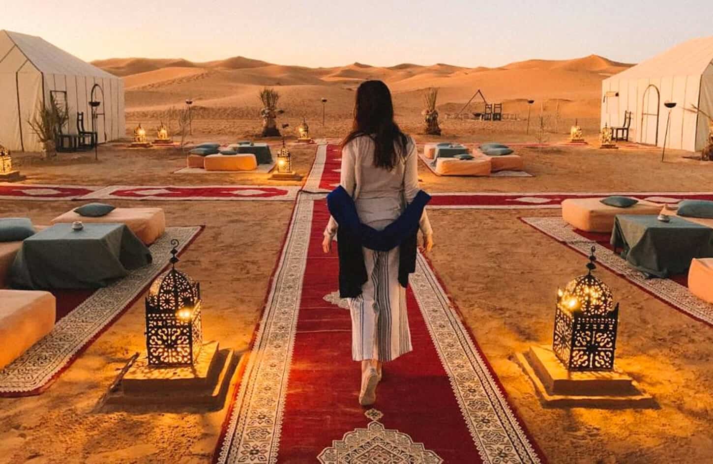 Great picture of a woman in the desert with camps