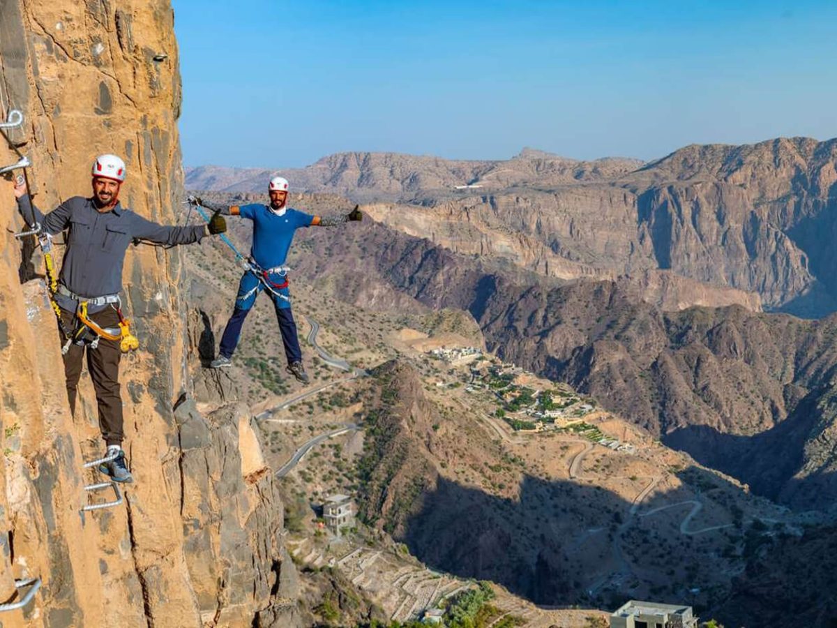Great picture of tourists climbing mountains in Oman