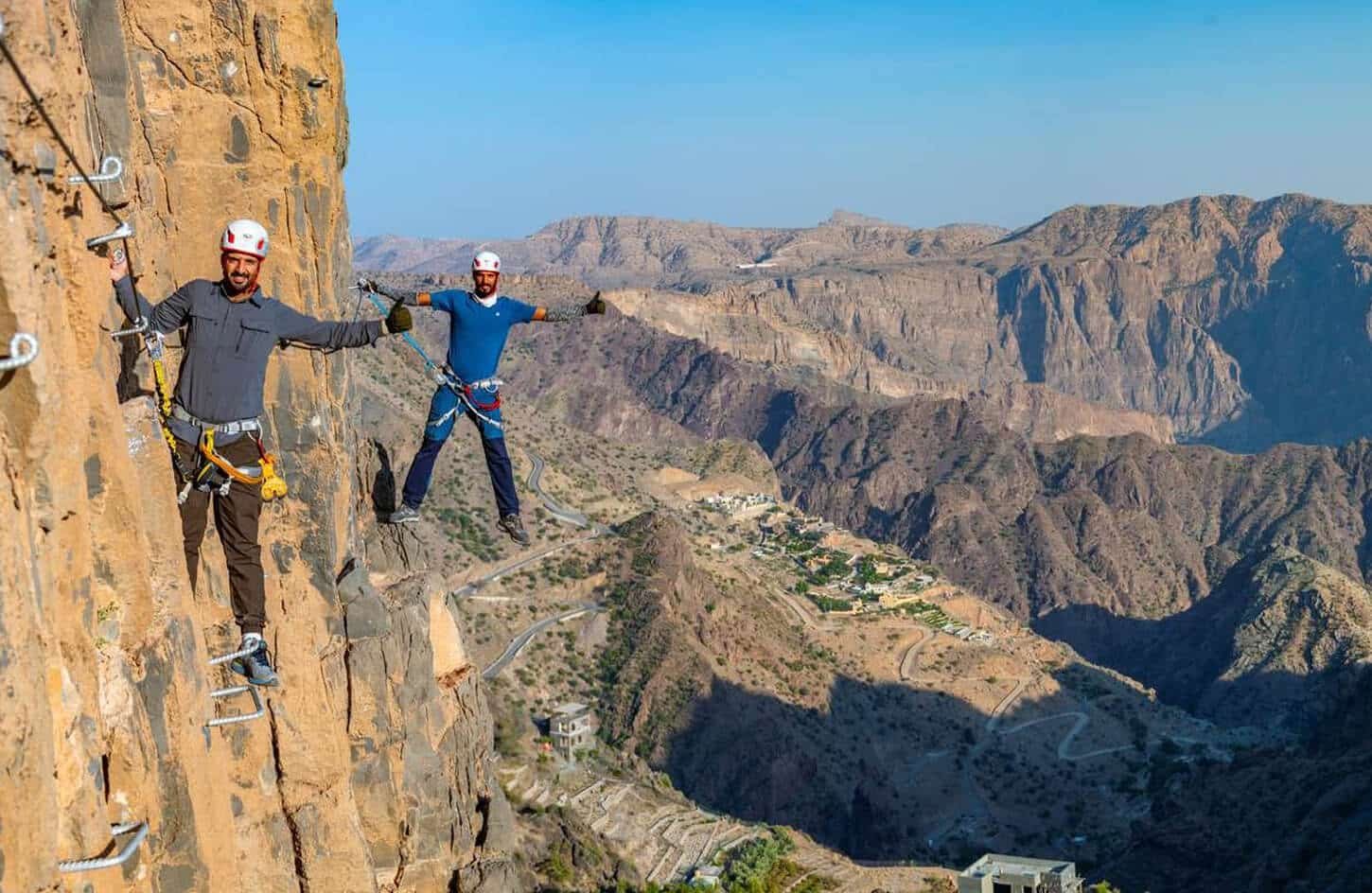 Great picture of tourists climbing mountains in Oman