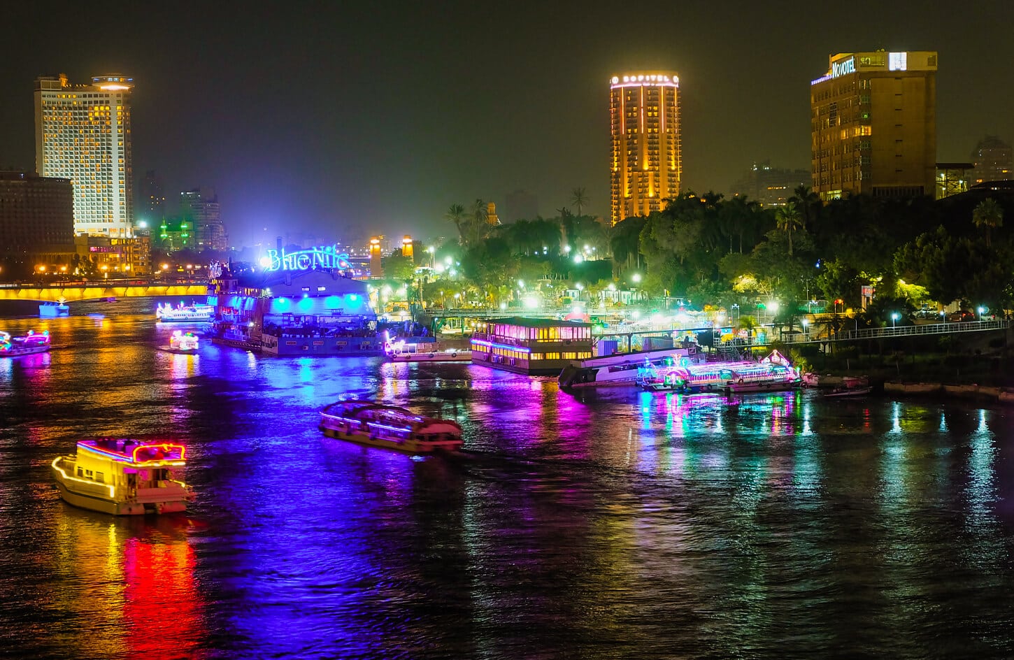 Nile cruise boats at night from Cairo