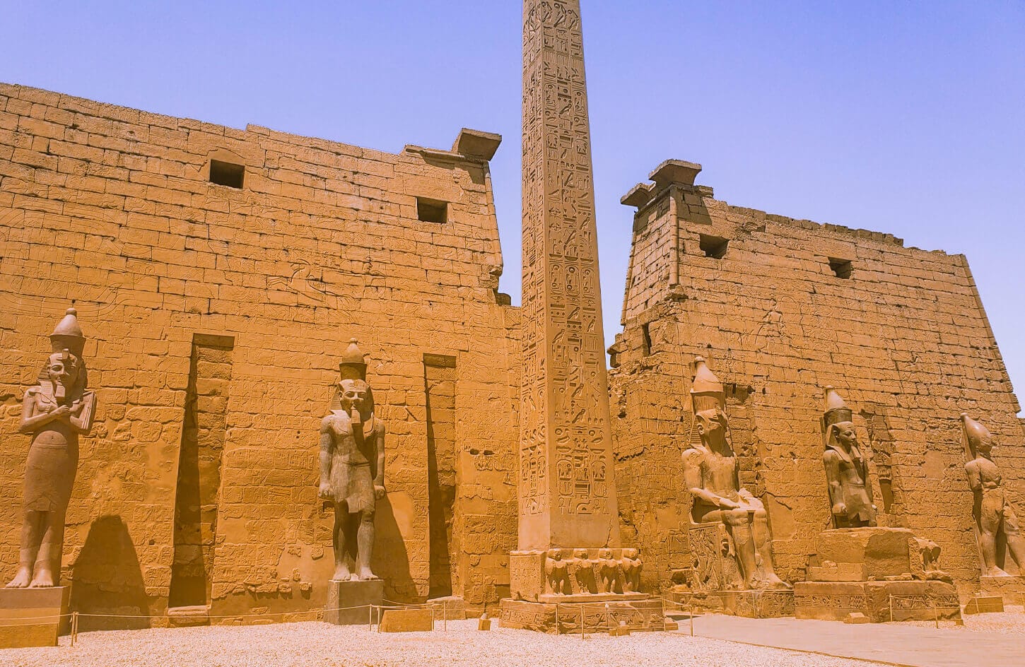 Statues and an obelisk of the Luxor Temple facade