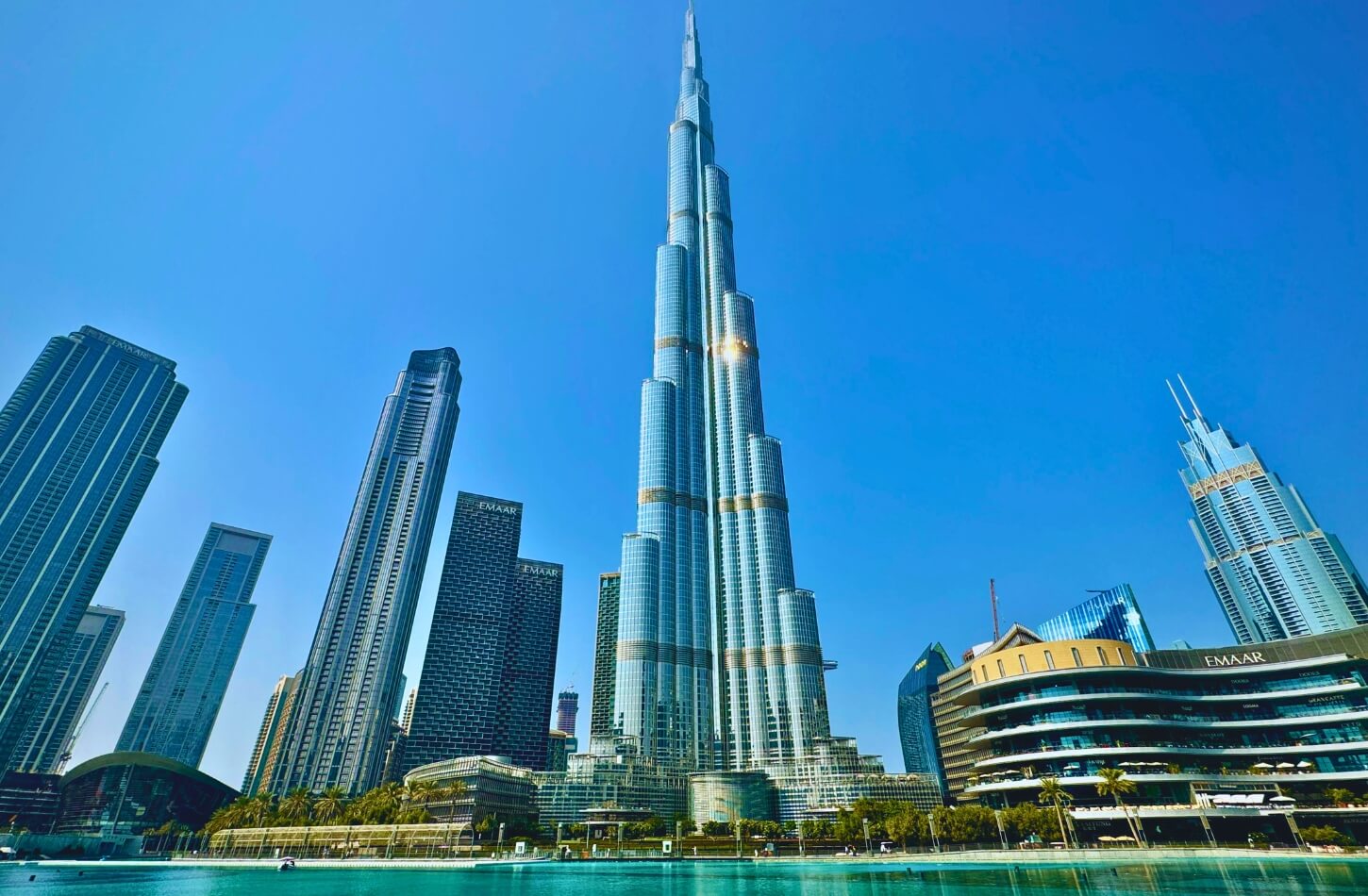 a panoramic view of the burj khalifa standing tall above all surrounding buildings
