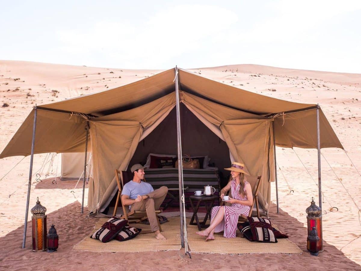 a wonderful shot of a couple from wahiba sands