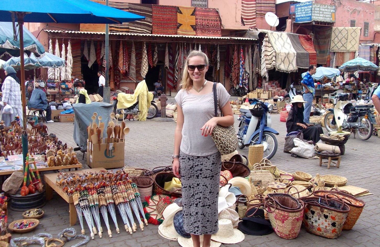 a wonderful shot of a girl from one of the markets in marrakech morocco