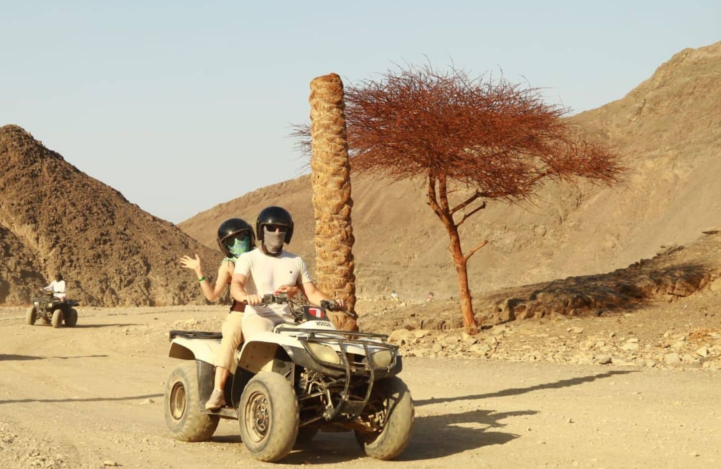 A wonderful shot of a couple riding a quad bike in Marsa Alam