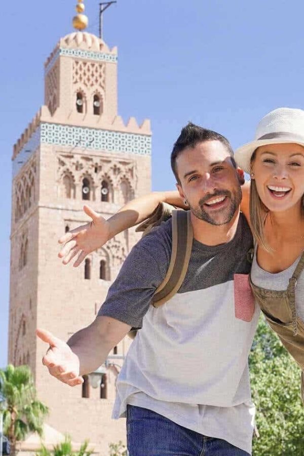 A wonderful picture of a couple in front of the Sultan Hassan Mosque in Morocco